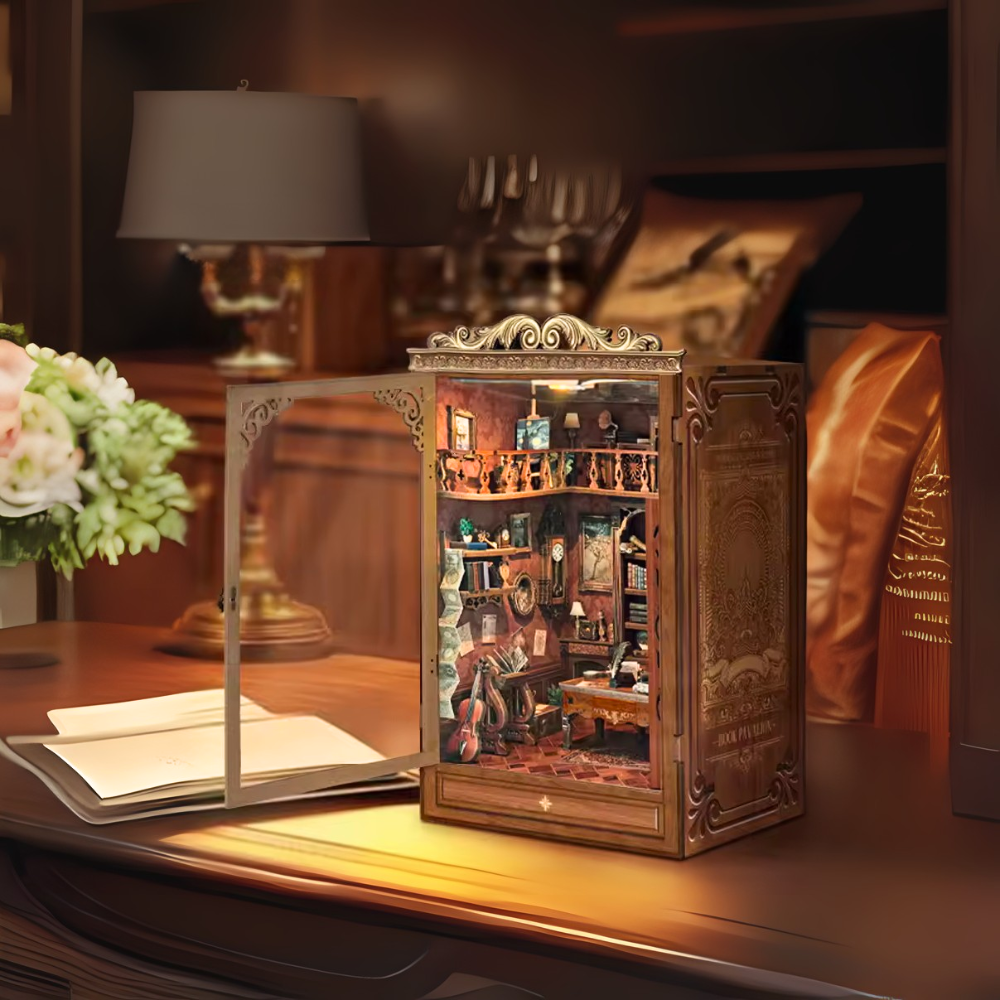 DIY book nook kit “Timekeeper’s Library,” featuring a charming home library with towering bookshelves, glowing lights, and a pendulum clock, An endearing DIY and crafts project for book nook collectors.