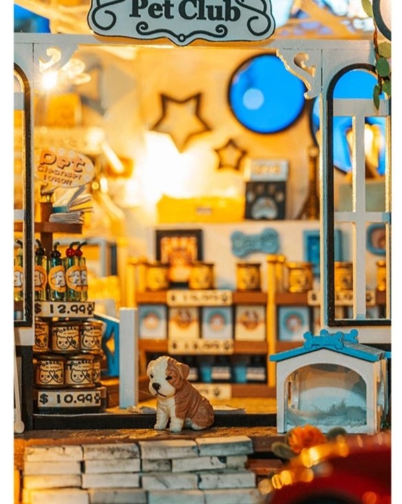 DIY miniature pet store kit featuring a tiny storefront, cats, dogs, detailed mini furniture, and scale model accessories — perfect for miniature lovers and DIY crafts.