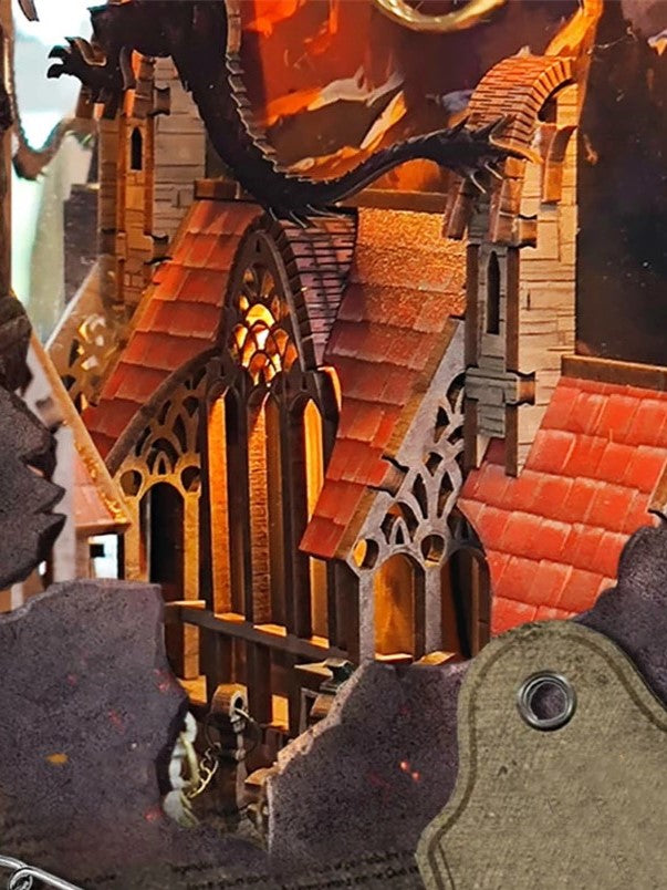 DIY fantasy book nook kit featuring a dragon-themed miniature valley with stone bridges, rooftops, and glowing landscape — ideal for miniature fans, DIY crafts, and book nook collectors.