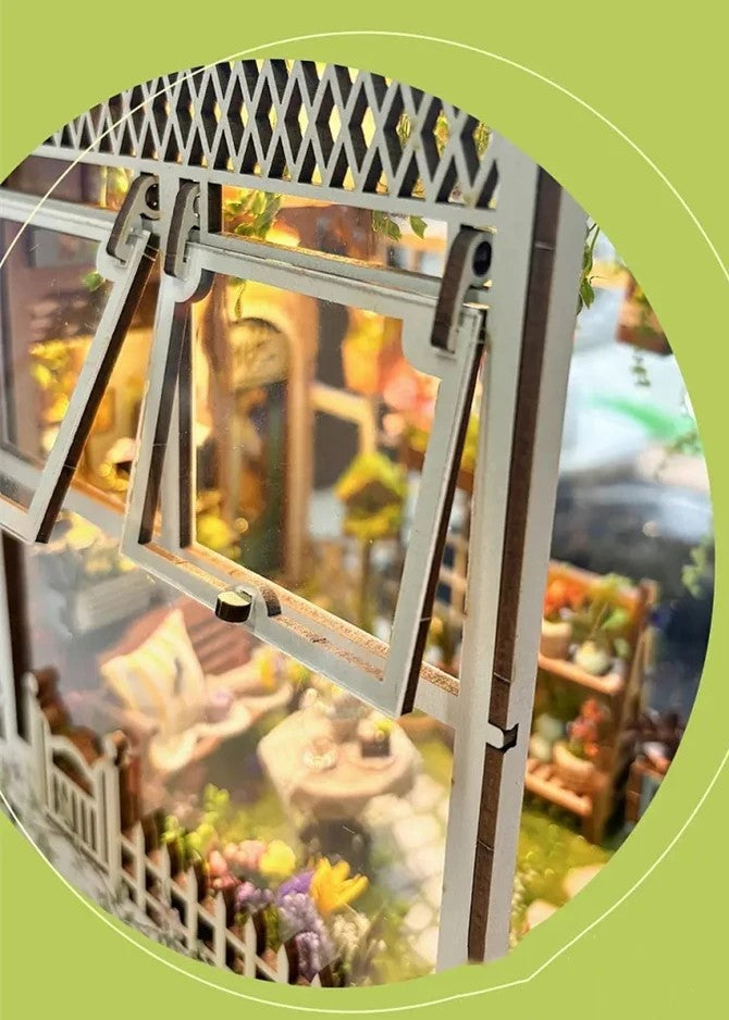 DIY garden book nook kit featuring a miniature outdoor café, greenery, tiny table setup, and rustic path — perfect for miniature lovers, DIY crafts, book nook fans, and small DIY house decor.