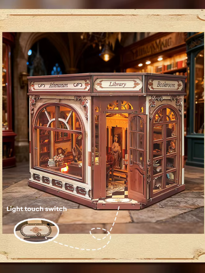 DIY miniature house kit styled as an Athenaeum library with classical columns, bookshelves, and warm lighting in an old-world study.