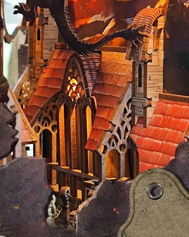 DIY fantasy book nook kit featuring a dragon-themed miniature valley with stone bridges, rooftops, and glowing landscape — ideal for miniature fans, DIY crafts, and book nook collectors.