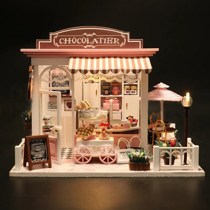 DIY miniature chocolate shop kit – a tiny dollhouse-style chocolatier with LED lights, perfect for book nook lovers, miniature mansion collectors, and fans of DIY crafts, miniatures, and small DIY houses.