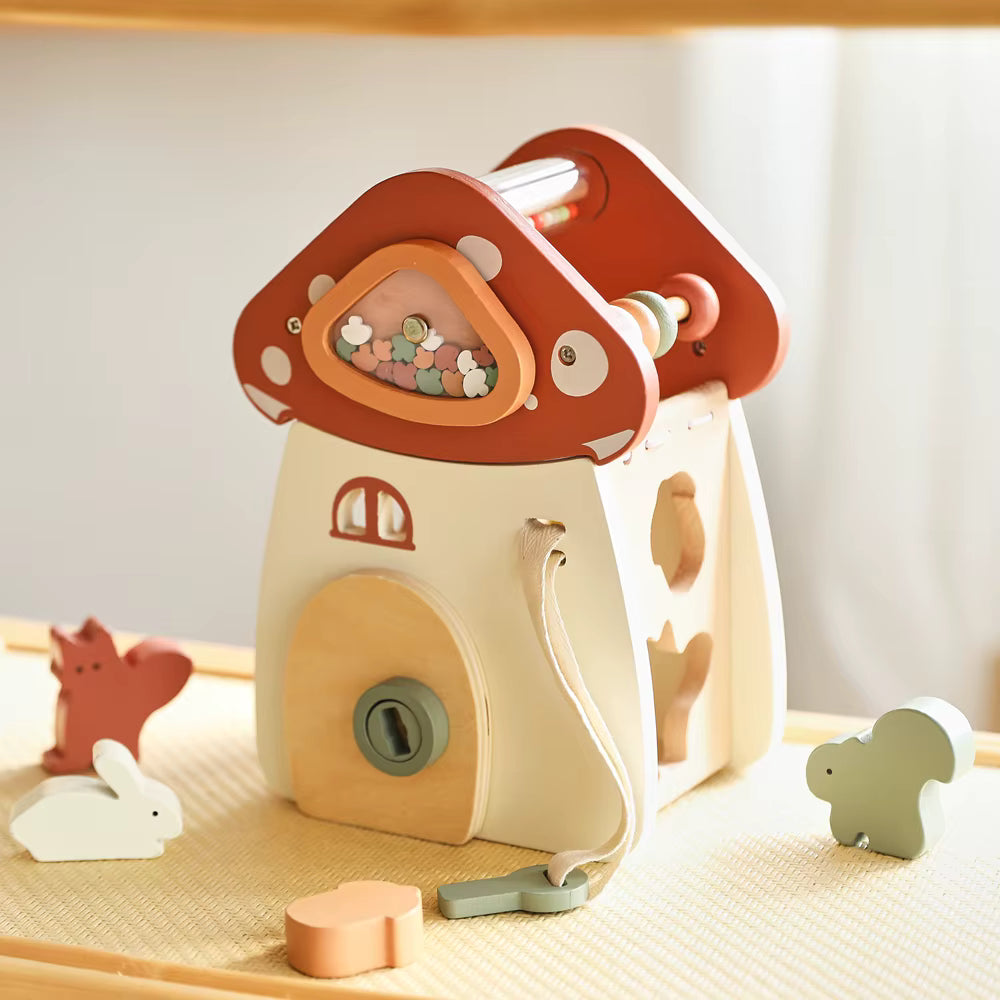Montessori wooden mushroom house toy set with a xylophone, whimsical details, accessories, and characters, designed for imaginative pretend play and fine motor skill development.