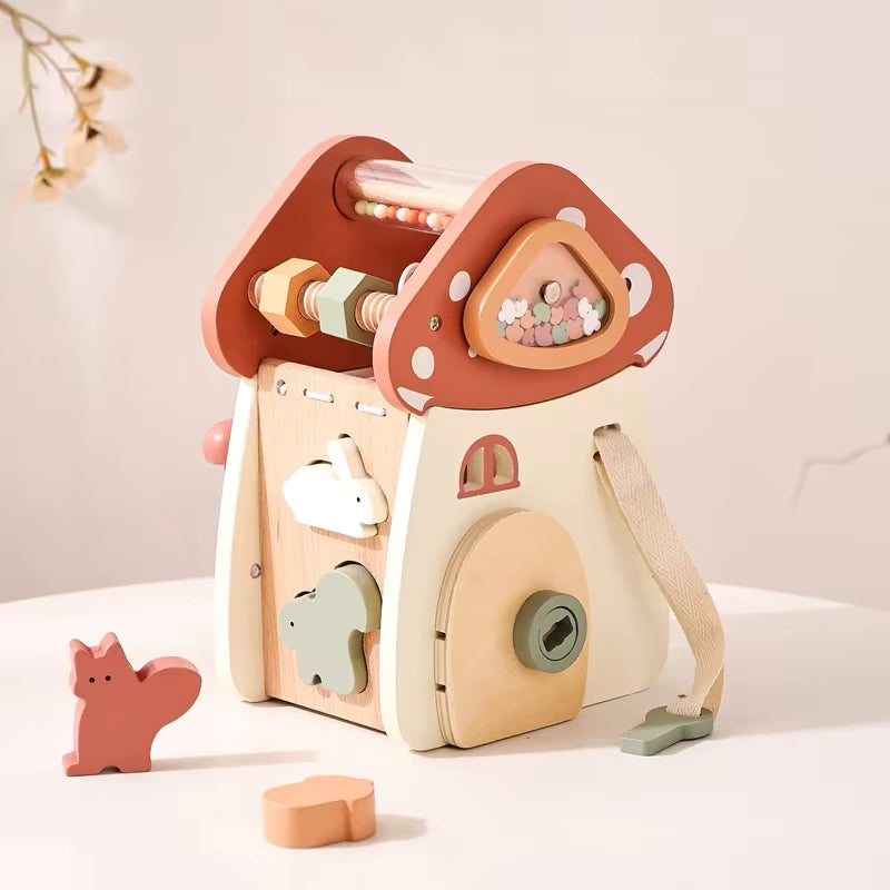 Montessori wooden mushroom house toy set with a xylophone, whimsical details, accessories, and characters, designed for imaginative pretend play and fine motor skill development.