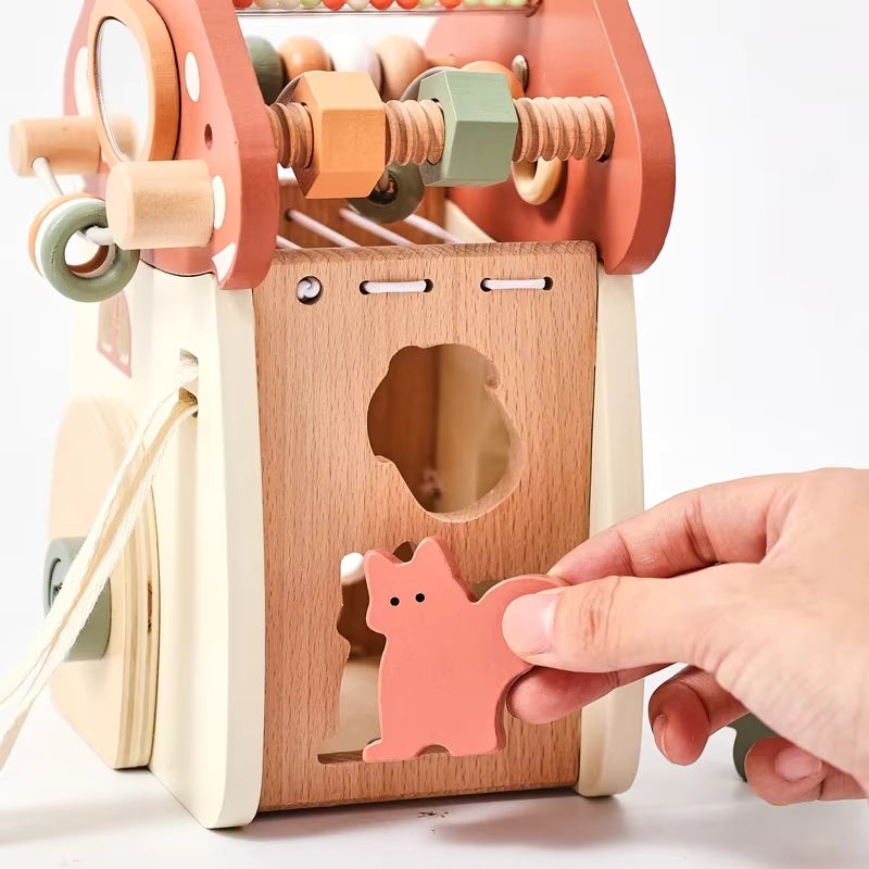 Montessori wooden mushroom house toy set with a xylophone, whimsical details, accessories, and characters, designed for imaginative pretend play and fine motor skill development.