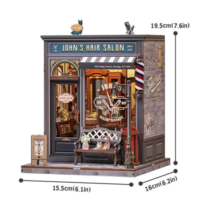 DIY book nook kit “Pomade Parlor,” featuring a vintage barbershop and hair salon interior with red chairs, mirrors, wooden shelves, and miniature grooming tools. A nostalgic DIY and crafts project for fans of retro style, miniatures, and classic salon design.