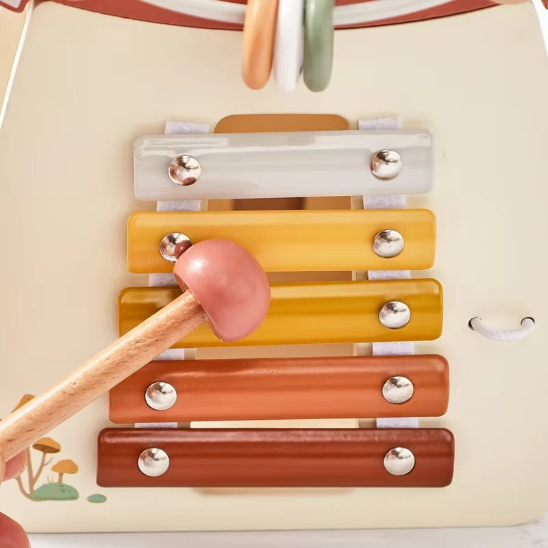 Montessori wooden mushroom house toy set with a xylophone, whimsical details, accessories, and characters, designed for imaginative pretend play and fine motor skill development.