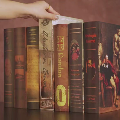 DIY miniature book nook of a Wild West street scene featuring a saloon façade with swinging doors, wooden signage, warm lantern lighting, and rustic storefront details, evoking a classic frontier town at dusk.