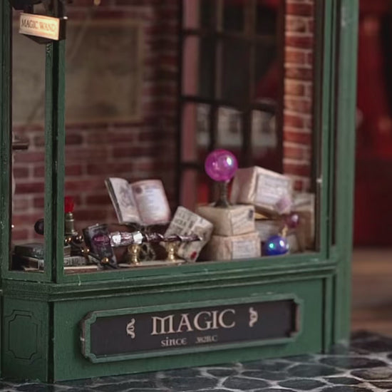 DIY miniature magic shop kit with tiny potions, spell books, glowing lights, and detailed scale model decor — perfect for miniature collectors, DIY crafts, and small DIY house lovers.