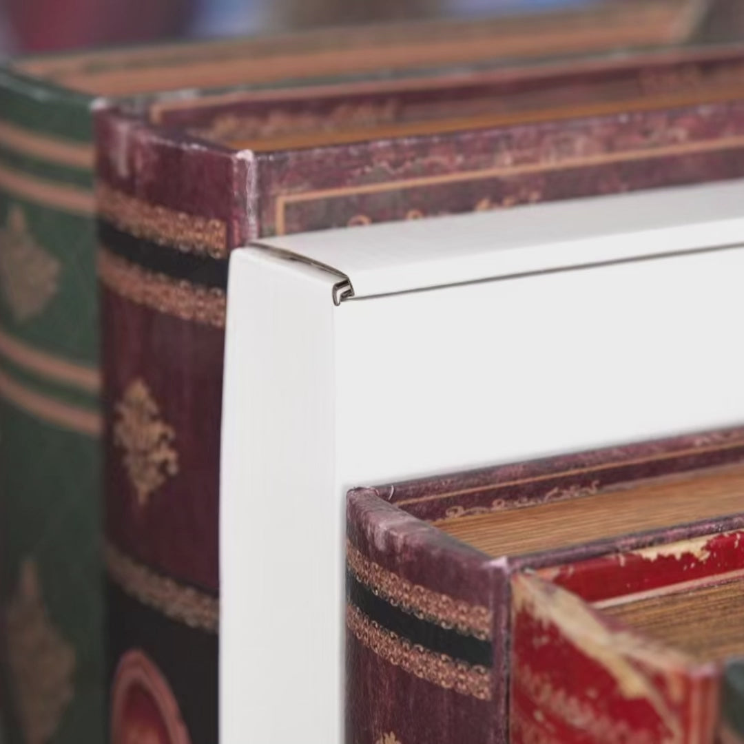 DIY book nook kit “Merry Market Lane,” featuring a warmly lit winter street with festive storefronts, snow-topped rooftops, and a softly bustling holiday vibe. A detailed DIY and crafts project perfect for holiday lovers and miniature collectors.