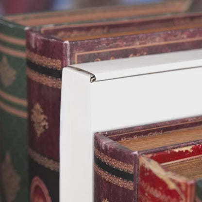 DIY book nook kit “Merry Market Lane,” featuring a warmly lit winter street with festive storefronts, snow-topped rooftops, and a softly bustling holiday vibe. A detailed DIY and crafts project perfect for holiday lovers and miniature collectors.