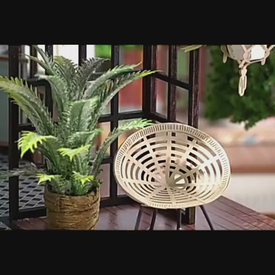 DIY miniature house kit of a two-story garden loft café with spiral stairs, tiny furniture, plants, and glowing lights – perfect for craft ideas, diy and crafts, miniature mansion lovers, and diy miniature home building.