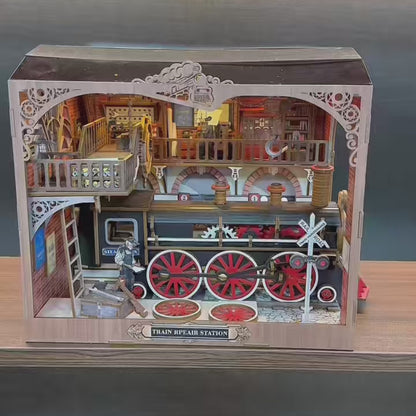 DIY miniature house kit of a vintage locomotive train repair station with intricate gears, scale model train, and glowing interior lights – perfect for craft ideas, DIY and crafts, miniature mansion lovers, and DIY book nook kit collectors.