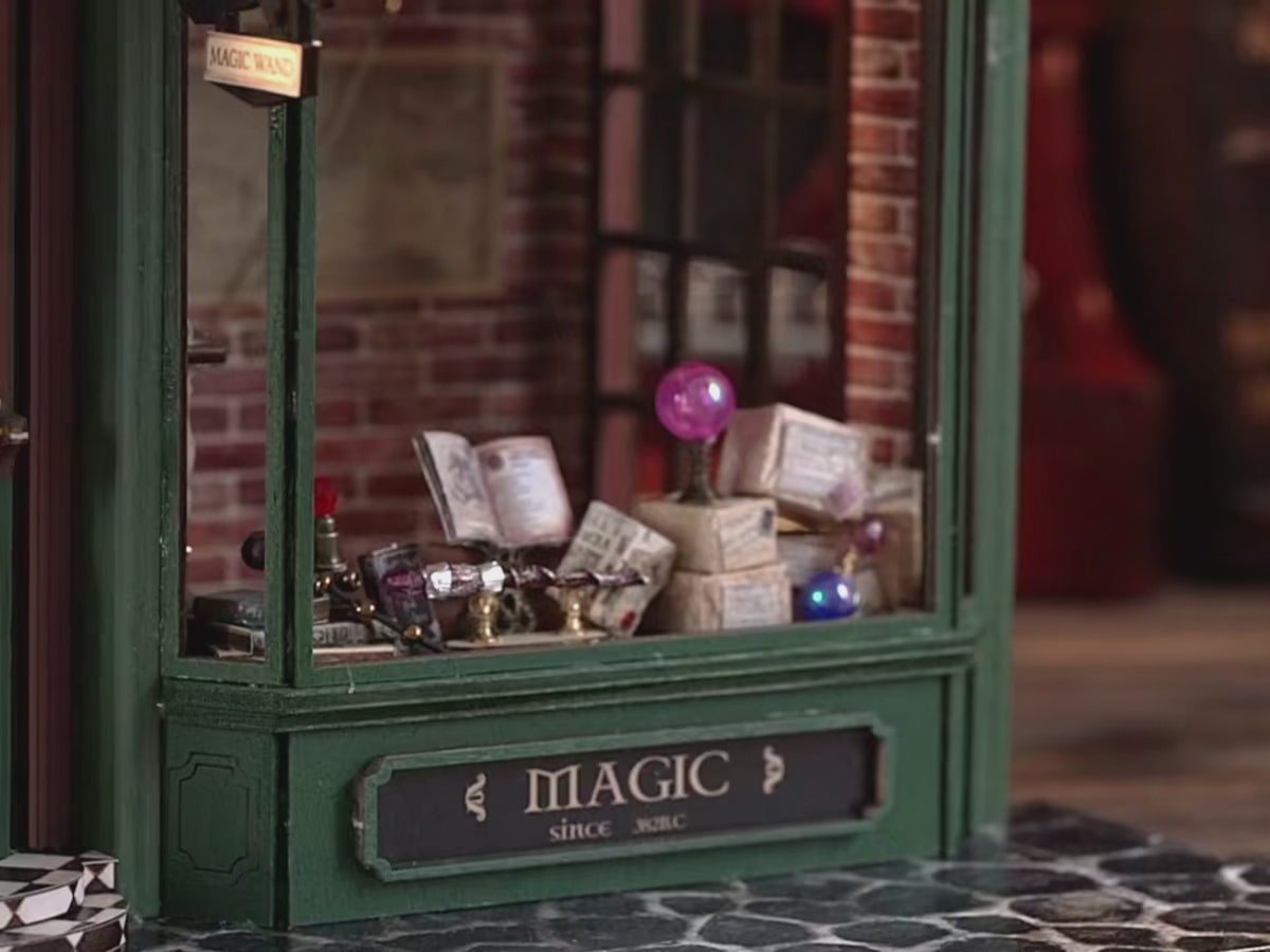 DIY miniature magic shop kit with tiny potions, spell books, glowing lights, and detailed scale model decor — perfect for miniature collectors, DIY crafts, and small DIY house lovers.